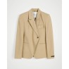 Pack Shot af Herskind Oprah asymmetrisk blazer i beige på neutral baggrund
