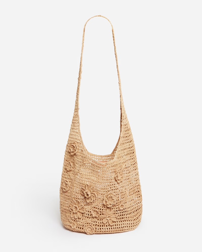 Pack shot af Vanessa Bruno Raffia Hobo Bag Naturel Taske på hvid baggrund