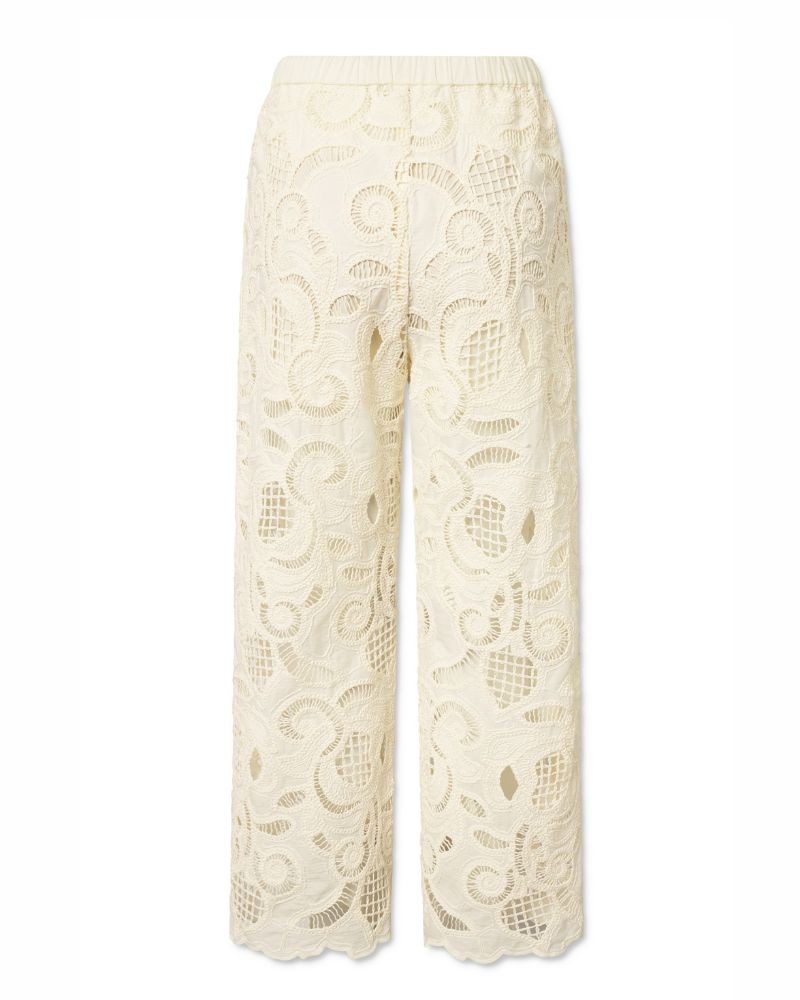 Pack shot af Nué Notes Miami Pants Egret Ecru blonde bukser set bagfra på hvid baggrund