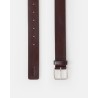 Close up af Closed Belt Light Mocha Brown på neutral baggrund