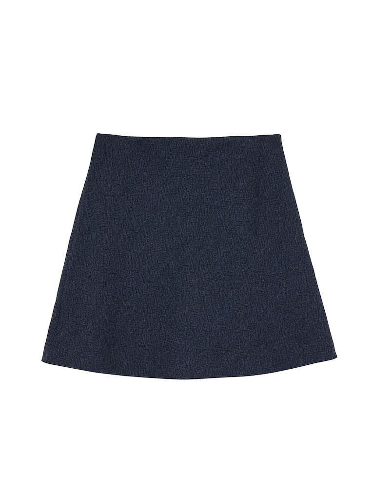 Pack shot af Skall Studio Fifi Skirt Navy Black på hvid baggrund