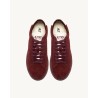 Pack shot af Autry Dallas Low sneaker bordeaux på neutral baggrund