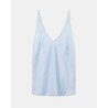 Pack shot af Dorothee Schumacher Sense Of Shine Top Ice Sky på neutral baggrund